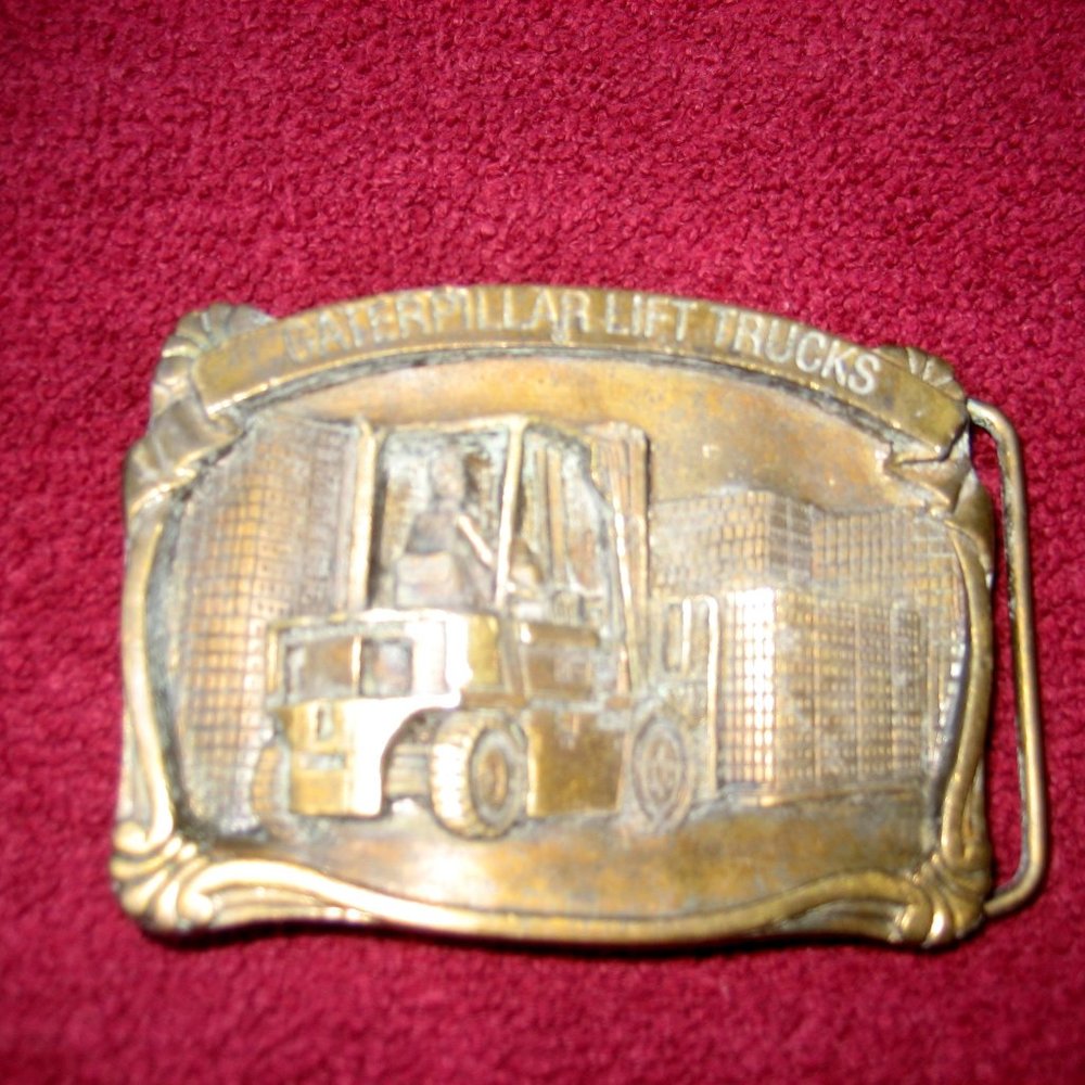 LARGE BRASS CATERPILLAR LIFT TRUCKS BELT BUCKLE 3"x2.25"